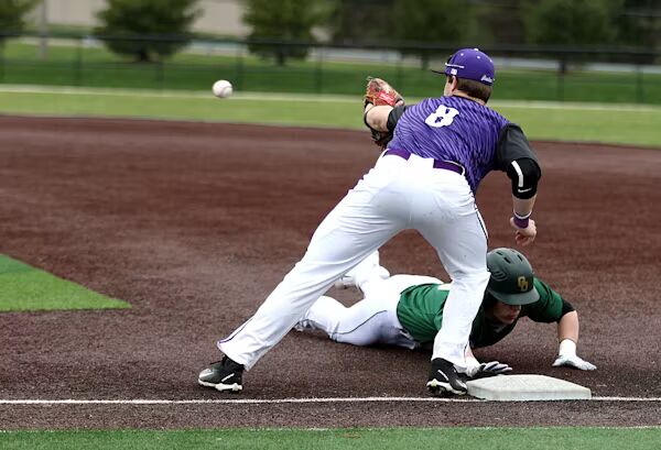 Baseball pitcher winding up on mound
