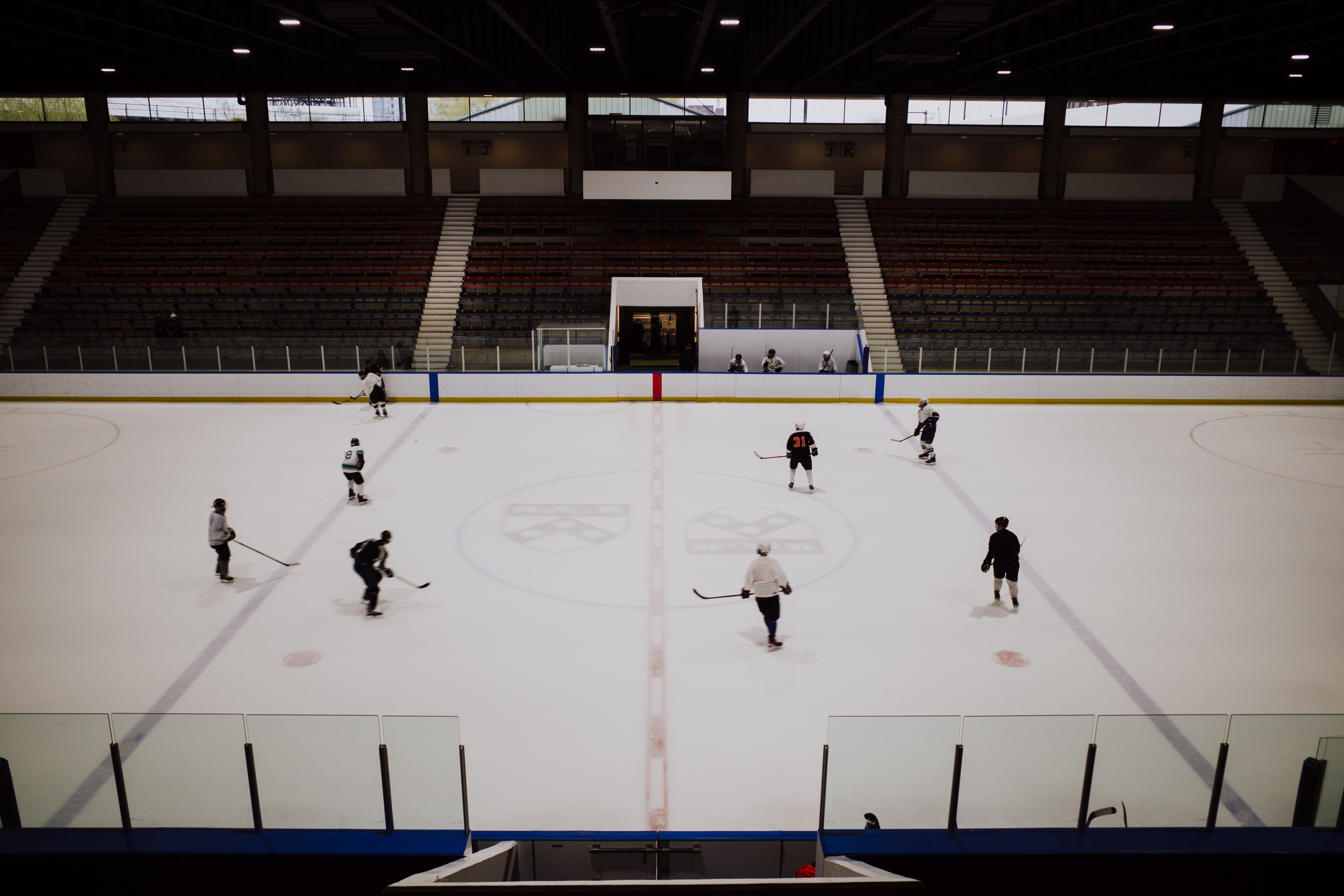 Hockey player skating with puck